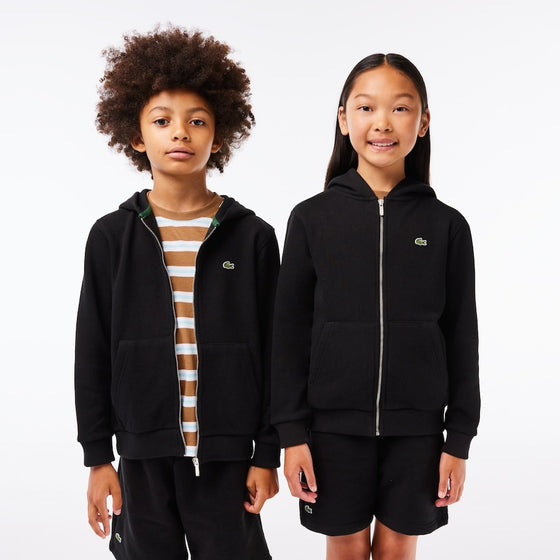 Sweatshirts of children with zip and hood and pocket in a marsupium pocket